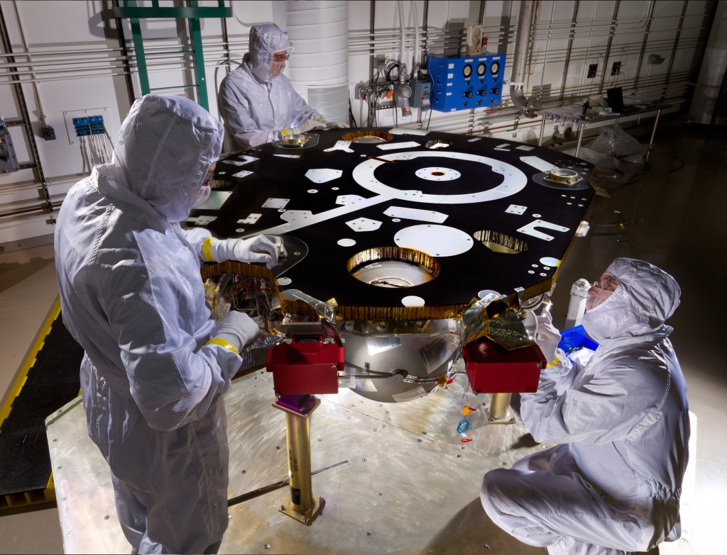 Technicians at Lockheed Martin's facility near Denver work on the InSight lander's primary structure last year. Credit: Lockheed Martin