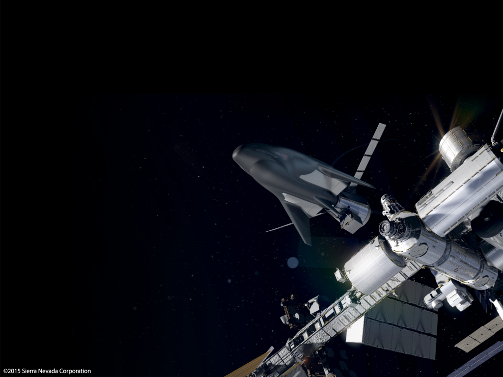 Artist's concept of the Dream Chaser cargo carrier at the International Space Station. Credit: Sierra Nevada Corp.