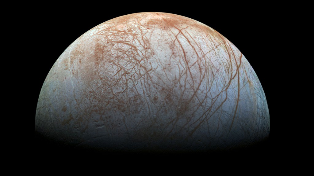 The puzzling, fascinating surface of Jupiter's icy moon Europa looms large in this newly-reprocessed color view, made from images taken by NASA's Galileo spacecraft in the late 1990s. Credit: NASA/JPL-Caltech/SETI Institute