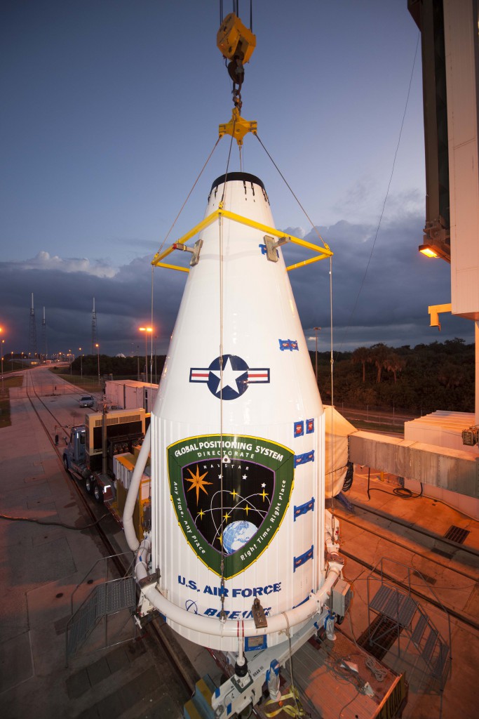 File photo of GPS hoisting atop Atlas. Credit: ULA