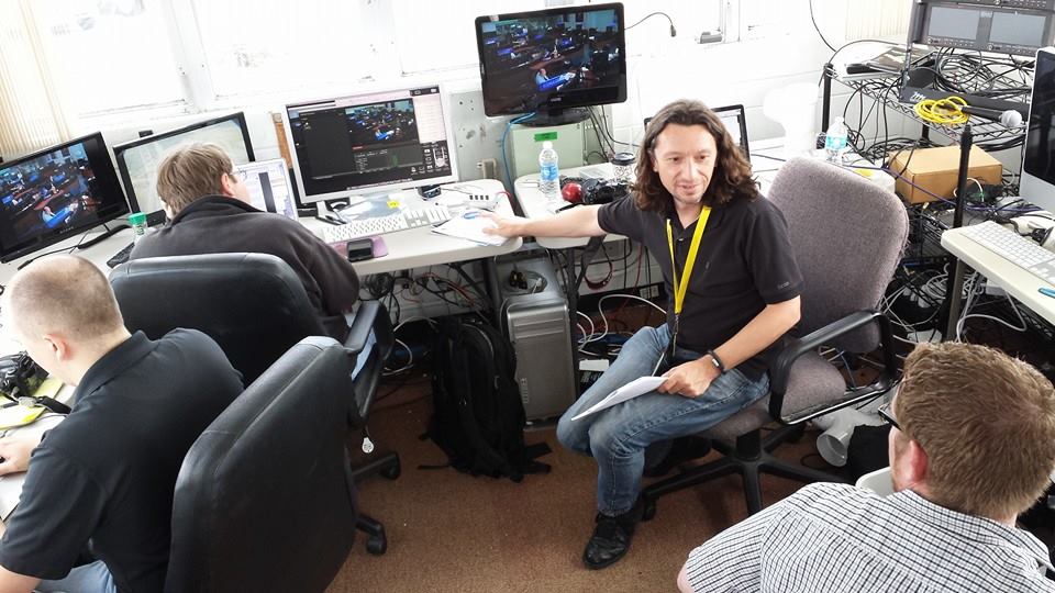 The Spaceflight Now team at work in December 2014 covering the EFT-1 mission from our Kennedy Space Center news bureau.