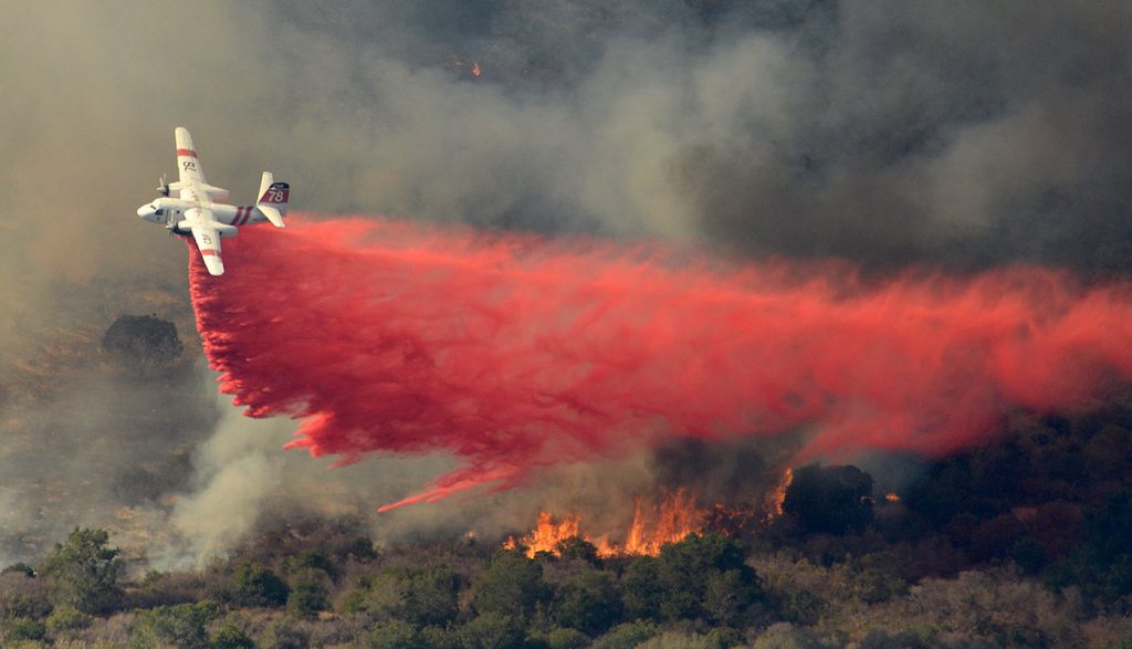 A CalFire S-2T makes a Phos-Chek drop on the Vandenberg fire. Credit: Santa Barbara County Fire Dept.