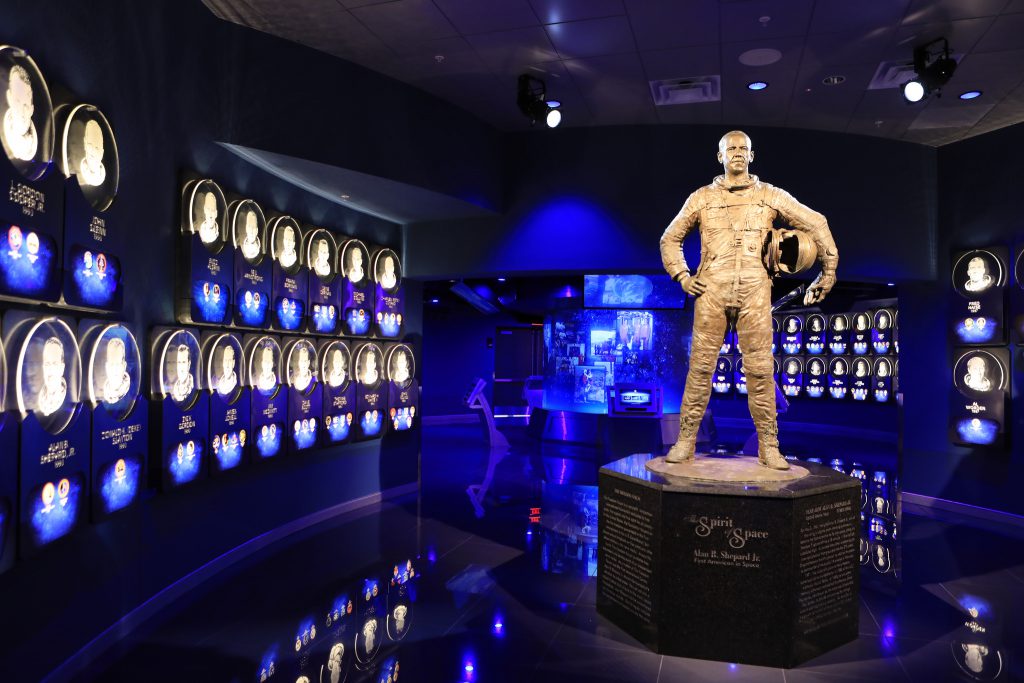 A statue of astronaut Alan Shepard, America's first person in space, stands just inside the doors to the U.S. Astronaut Hall of Fame at the Kennedy Space Center Visitor Complex's new Heroes & Legends attraction. Credit: NASA/Glenn Benson