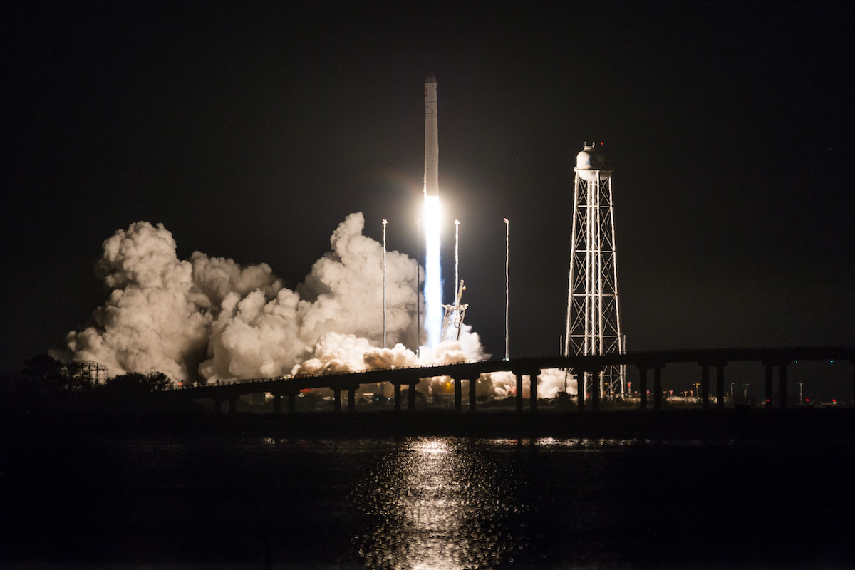 space shuttle blast off at night