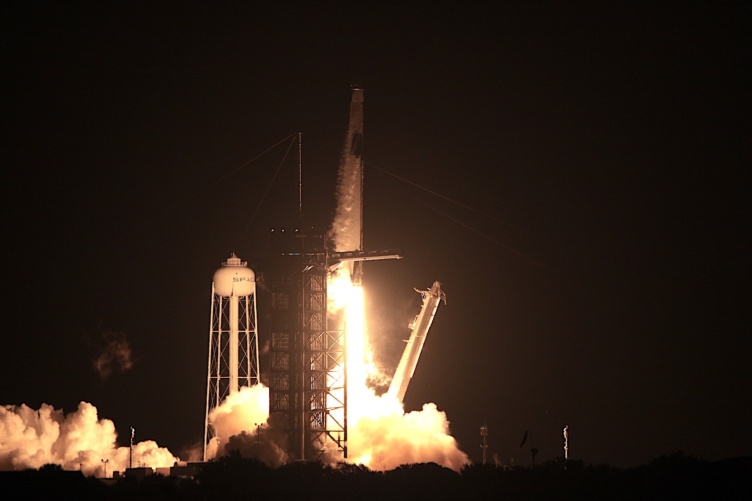 astronauts flying rocket