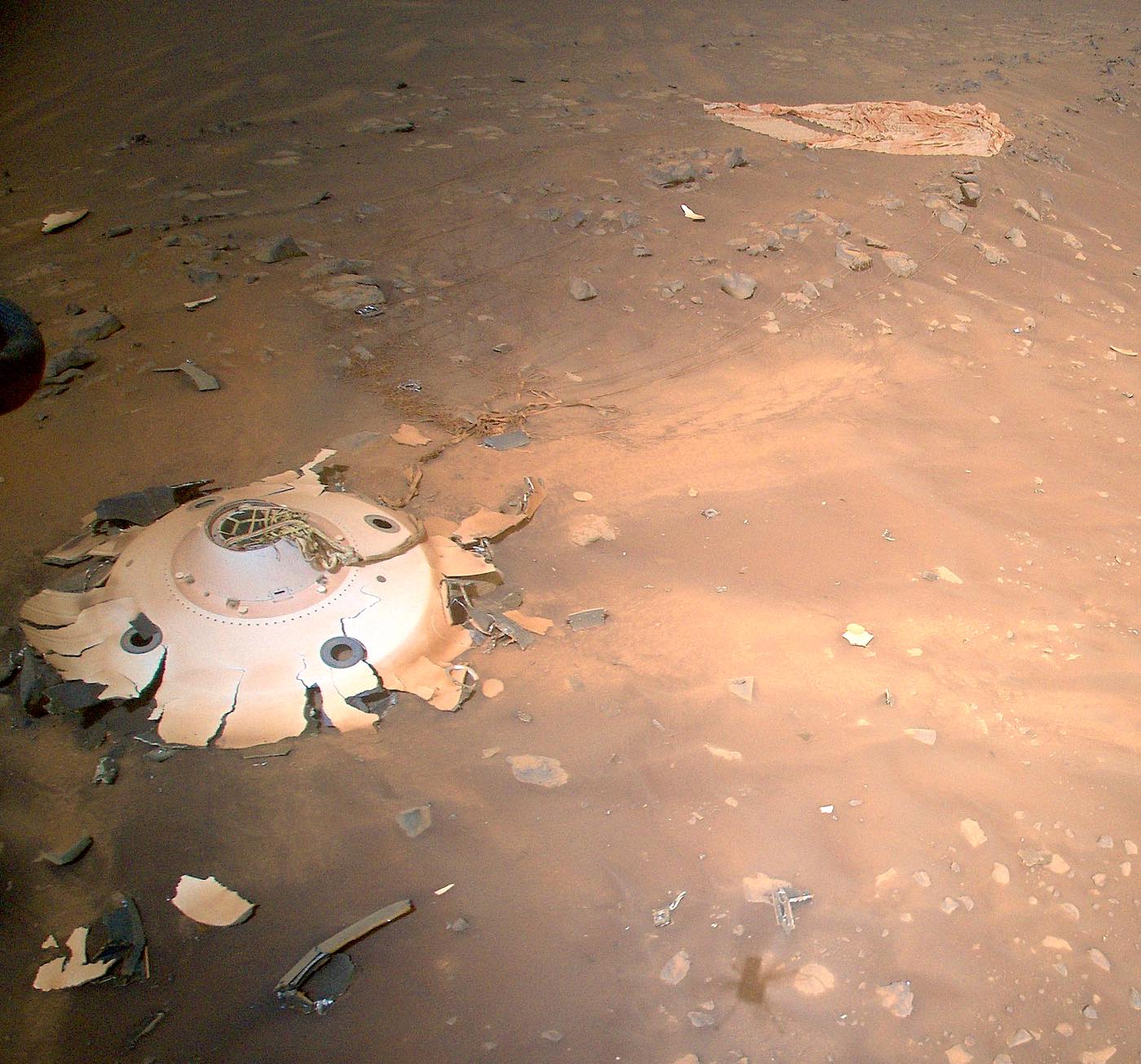 Ingenuity helicopter flies over leftover wreckage from Mars landing