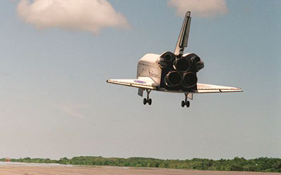 space shuttle flying