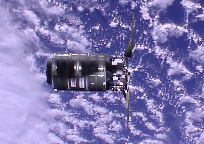 The Cygnus supply ship, measuring about 21 feet (6 meters) long, on final approach to the space station Sunday. Credit: NASA TV/Spaceflight Now