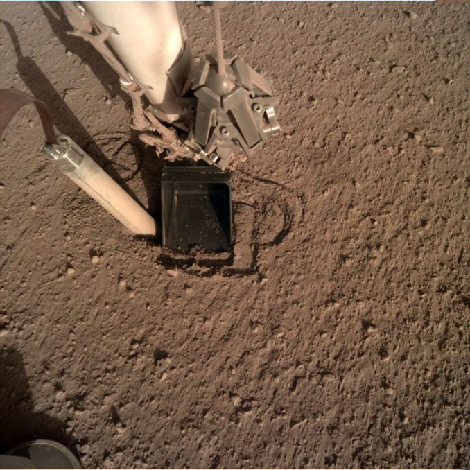 The "mole" of the InSight lander's Heat Flow and Physical Properties Package instrument its seen after backing out of its hole on Mars in this Oct. 26 image. Credit: NASA/JPL-Caltech