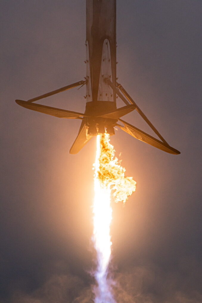 SpaceX's Falcon 9 booster returns through fog to Vandenberg Space Force Base after sending the German military's SARah 1 radar reconnaissance satellite into space. Credit: Brian Sandoval / Spaceflight Now