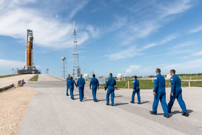 A cadre of NASA astronauts walks toward the Space Launch System moon rocket at Kennedy Space Center in Florida before launch of the Artemis 1 test flight last year. Credit: NASA/Josh Valcarcel